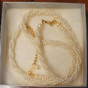 Elegant Pearl Necklace with Gold Accents